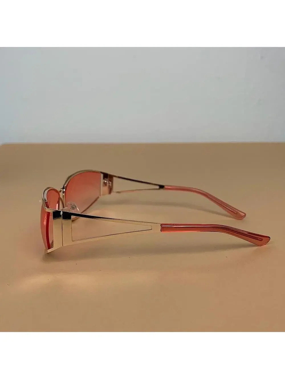 Vintage y2k 2000s classy pink chrome trim sunglasses. Chrome trim pink lenses